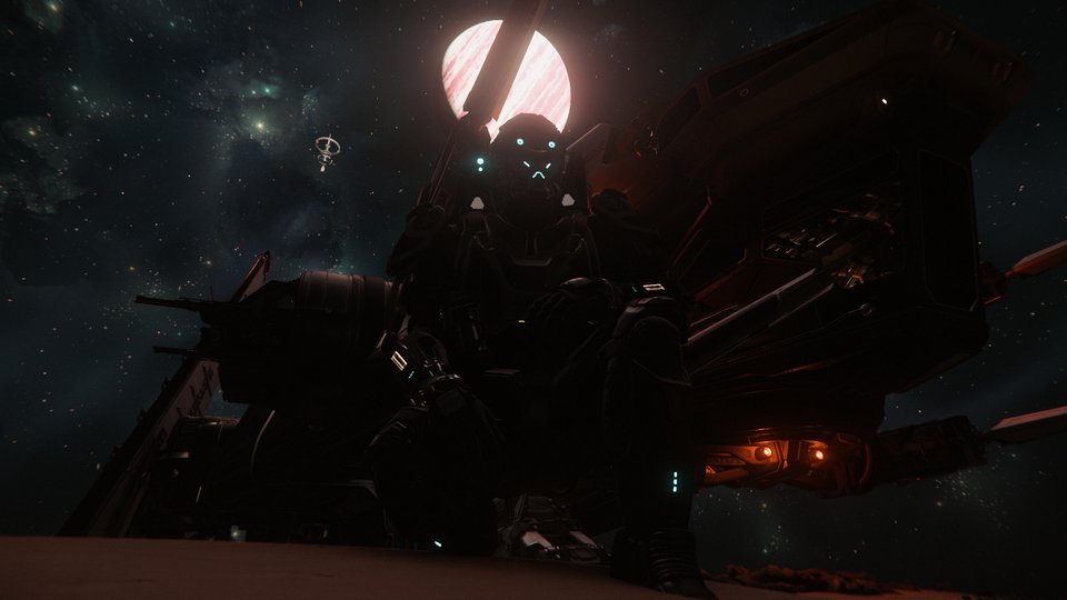 Operative crouched beneath a ship, teal visor lights glowing in the dark